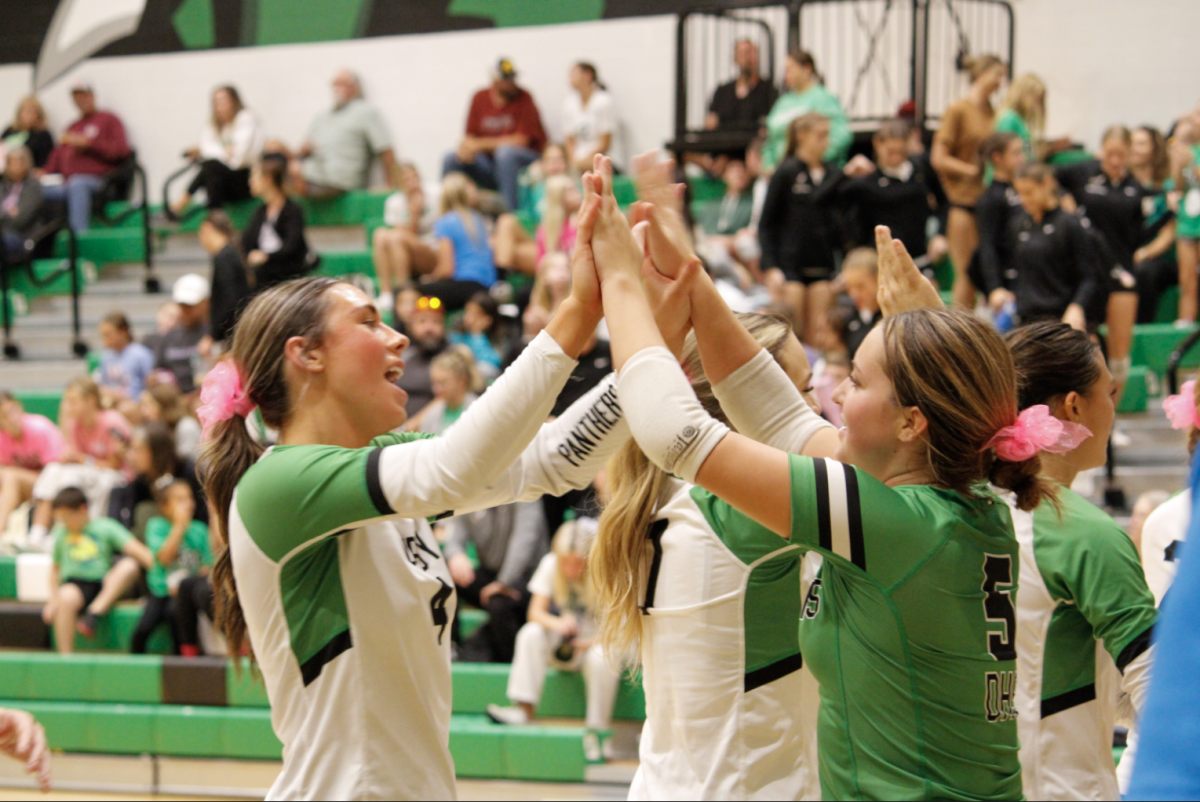 Team celebrating after game.